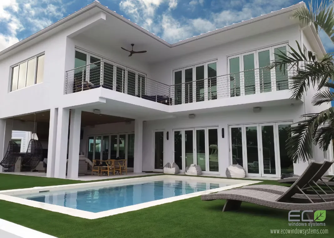 Modern two-story home exterior with pool